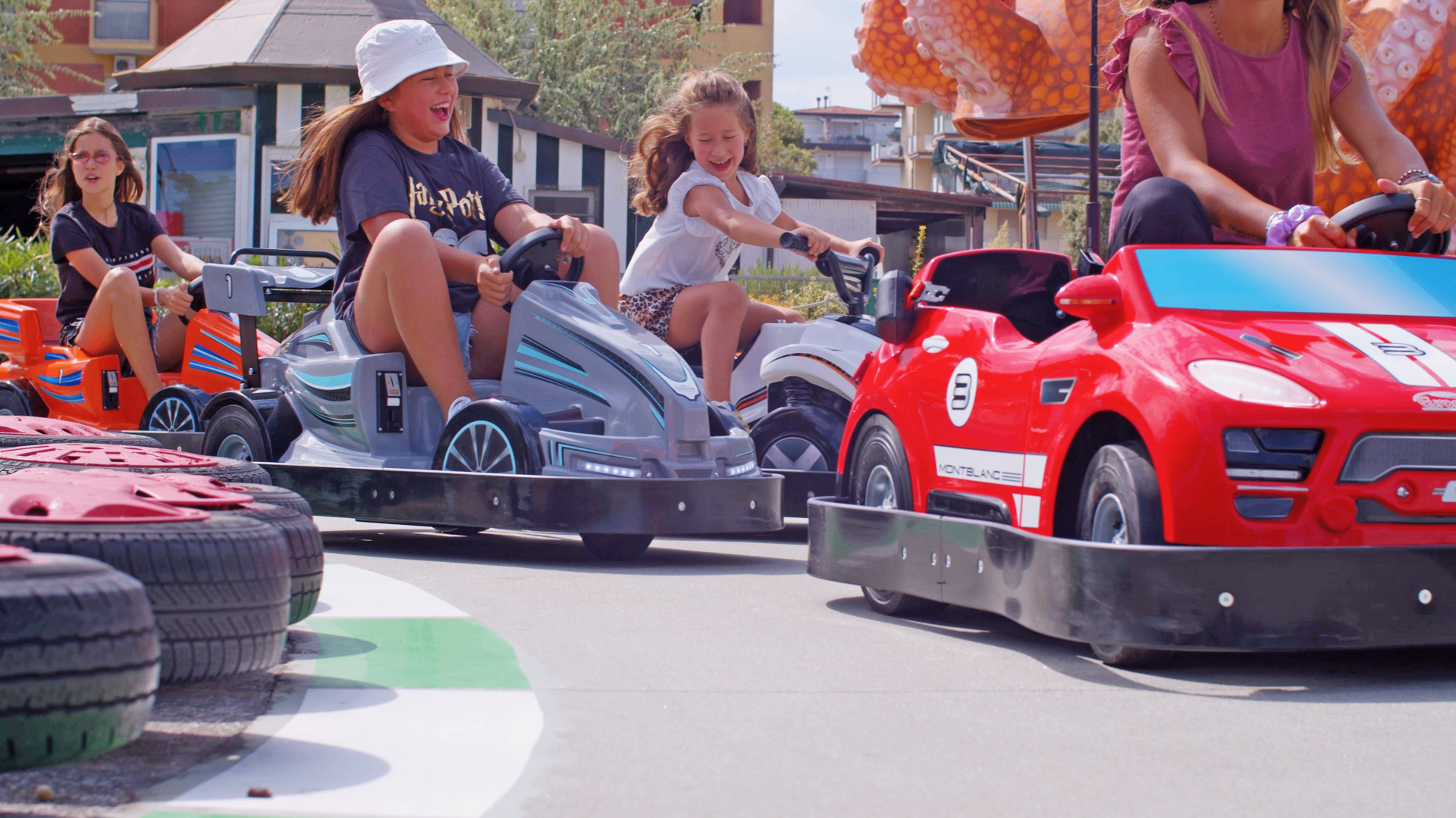 Children driving bumper cars
